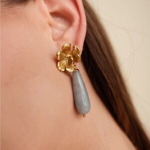 Semiprecious light blue drops with 18k gold plated flower stud. Tarnish free.